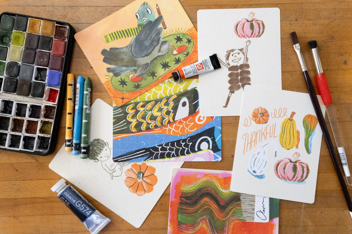 Monthly Postcard Club by Esther Nariyoshi: three original illustrated postcards laid out flat